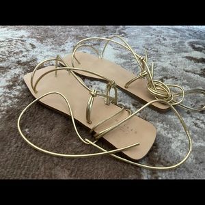 Brand new gold strappy sandals